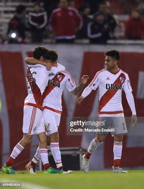 Lucas Martinez Quarta of River Plate celebrates with teammates Ignacio Fernandez and Gonzalo Martinez after scoring the first goal of his team during...