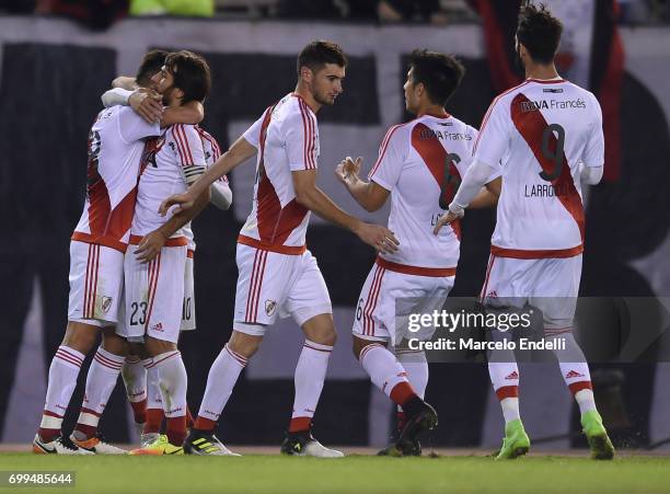 Lucas Martinez Quarta of River Plate celebrates with teammates after scoring the first goal of his team during a match between River Plate and...