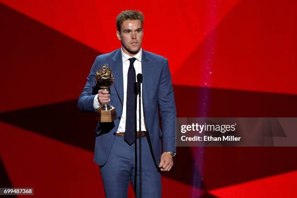 Connor McDavid of the Edmonton Oilers speaks after winning the Hart Memorial Trophy during the 2017 NHL Awards and Expansion Draft at T-Mobile Arena...