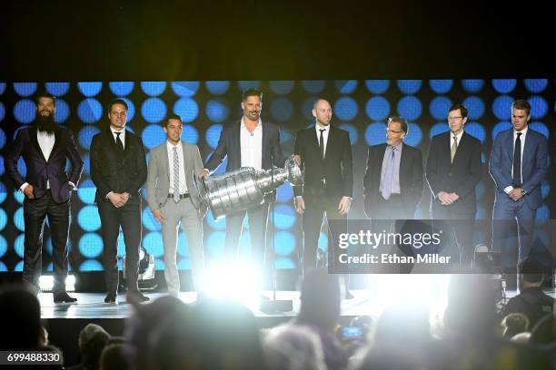 Host Joe Manganiello holds the Stanley Cup during the final moments of the show during the 2017 NHL Awards and Expansion Draft at T-Mobile Arena on...