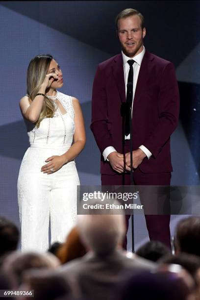 Bryan Bickell and wife Amanda Bickell speak onstage during the 2017 NHL Awards and Expansion Draft at T-Mobile Arena on June 21, 2017 in Las Vegas,...