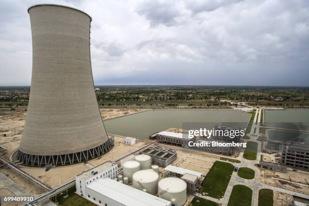 Cooling tower stands at the Sahiwal coal power plant, owned by China's state-owned Huaneng Shandong Rui Group, in Sahiwal, Punjab, Pakistan, on...