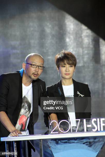 Director Guan Hu and his wife actress Liang Jing attend the I-SIFF Gala Night during the 20th International Film Festival on June 21, 2017 in...