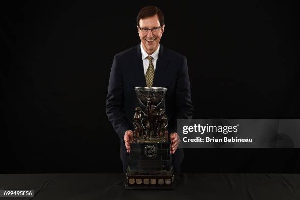 General manager David Poile of the Nashville Predators poses for a portrait with the NHL General Manager of the Year Award at the 2017 NHL Awards at...