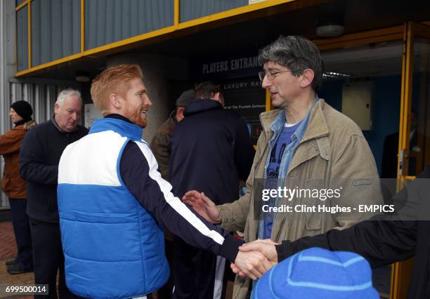 Reading's Paul McShane meets the fans on his way into the stadium.