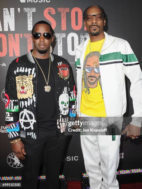 Sean Combs and Snoop Dogg arrive at the Los Angeles Premiere Of "Can't Stop Won't Stop" at Writers Guild of America, West on June 21, 2017 in Los...