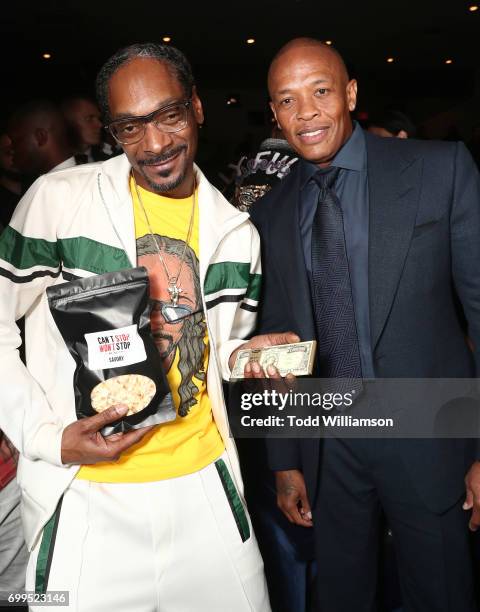 Snoop Dogg and Dr. Dre attends the Los Angeles Premiere of "Can't Stop Won't Stop" at the Writers Guild of America, West on June 21, 2017 in Los...