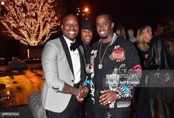 Tyrese Gibson and Mario Winans toast to Sean "Diddy" Combs and the world premiere of Can't Stop Won't Stop at the official after party powered by...