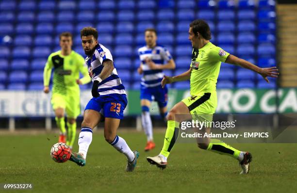 Reading's Daniel Williams and Huddersfield Town's Dean Whitehead battle for the ball