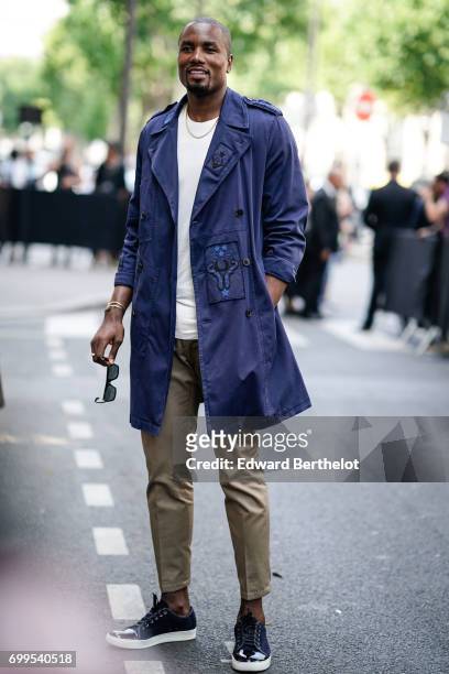 Basketball player Serge Ibaka is seen, outside the Valentino show, during Paris Fashion Week - Menswear Spring/Summer 2018, on June 21, 2017 in...