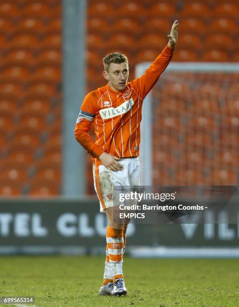 Blackpool's David Ferguson salutes the fans after the final whistle.