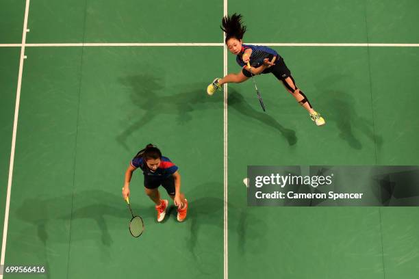 Celeste Lee and Chloe Lee of Australia compete during their R16 match against Chen Qingchen and Jia Yifan of China during the Australian Badminton...