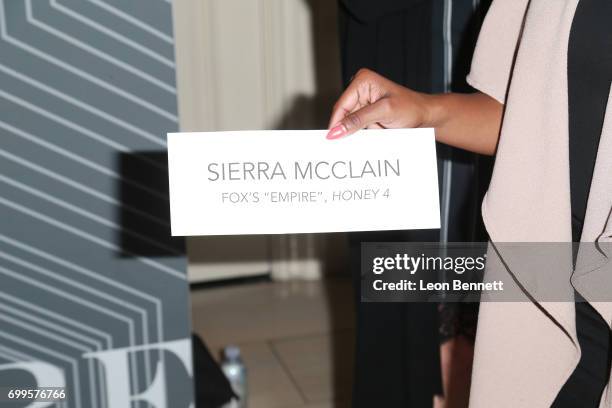 Actress Sierra McClain holds up a sign as she arrives at the 2017 BET Awards "PRE" at The London West Hollywood on June 21, 2017 in West Hollywood,...
