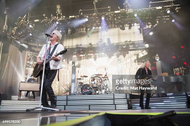 Kevin Cronin, Bryan Hill and Bruce Hall of REO Speedwagon perform on stage during the 'United We Rock Tour 2017' at White River Amphitheatre on June...