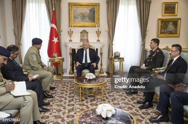 Turkish Prime Minister Binali Yildirim , Pakistani Army Chief General Qamar Javed Bajwa , Turkish Land Forces Commander Gen. Salih Zeki Colak and...