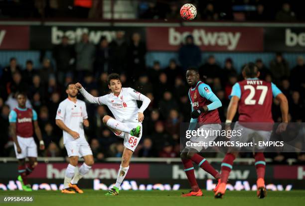 Liverpool's Pedro Chirivella and West Ham United's Cheikhou Kouyate in action during the Emirates FA Cup, fourth round replay match at Upton Park,...