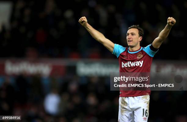 West Ham United's Mark Noble celebrates following the Emirates FA Cup, fourth round replay match at Upton Park, London.