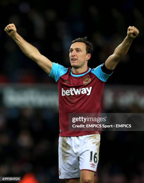 West Ham United's Mark Noble celebrates following the Emirates FA Cup, fourth round replay match at Upton Park, London.