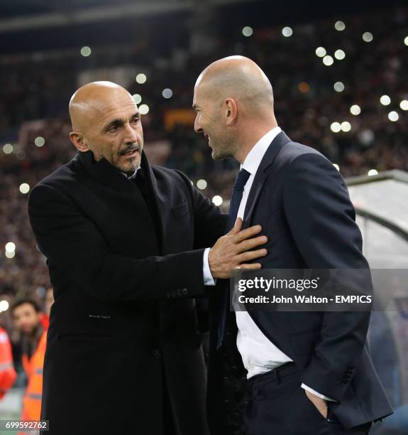 Roma coach Luciano Spalletti greets Real Madrid coach Zinedine Zidane before the start of the match