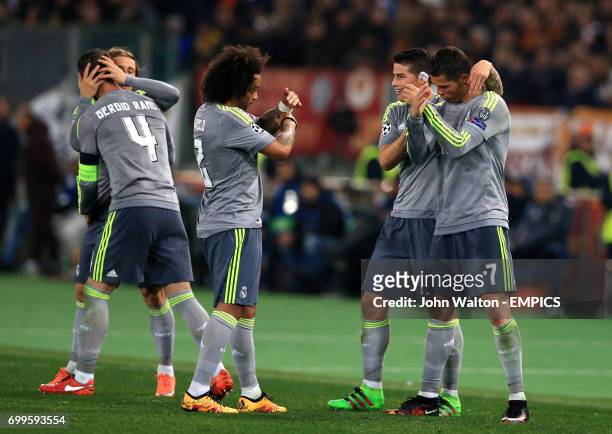 Real Madrid's Cristiano Ronaldo, celebrates scoring his side's first goal of the game with teammate Marcelo,