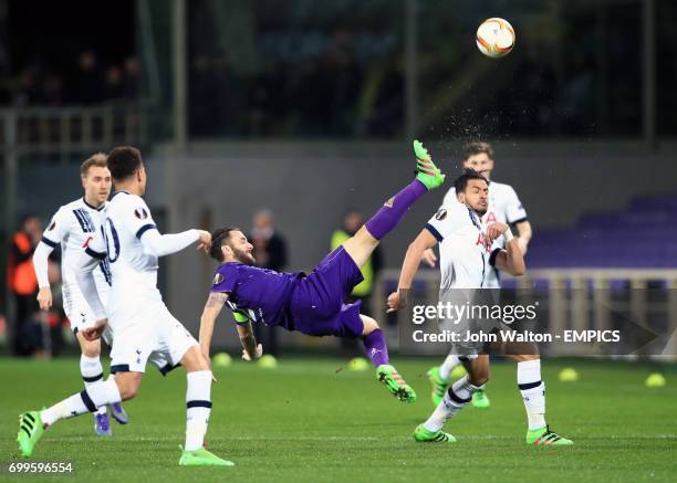 Fiorentina's Gonzalo Rodriguez and Tottenham Hotspur's Nacer Chadli battle for the ball