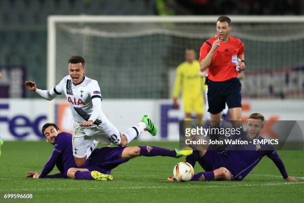Fiorentina's Davide Astori Tottenham Hotspur's Dele Alli and Fiorentina's Matias Fernandez battle for the ball