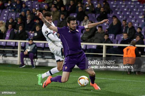 Tottenham Hotspur's Dele Alli and Fiorentina's Nenad Tomovic battle for the ball