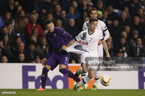 Fiorentina's Mauro Zarate pulls back on Tottenham Hotspur's Harry Winks