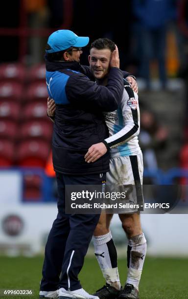 Huddersfield Town manager David Wagner with Harry Bunn after the final whistle