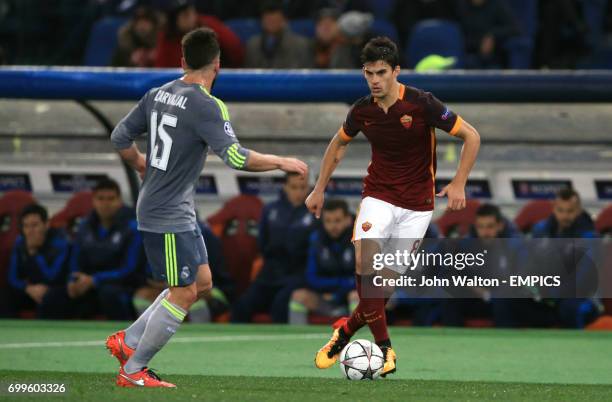 Roma's Diego Perotti takes on Real Madrid's Daniel Carvajal