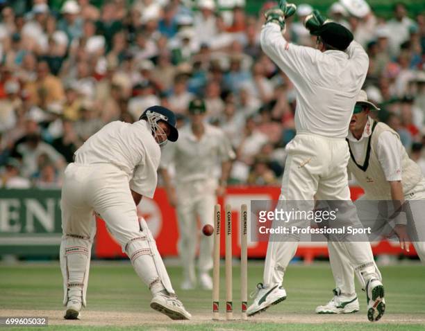 Alec Stewart of England is bowled for 1 in the 3rd Test match between England and Australia at Old Trafford, Manchester, 6th July 1997. The...