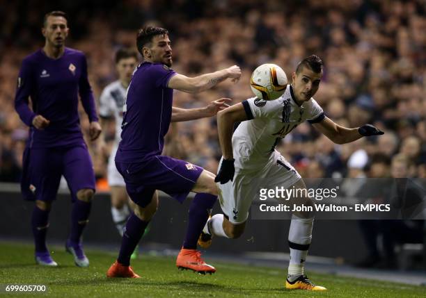Fiorentina's Nenad Tomovic and Tottenham Hotspur's Erik Lamela battle for the ball