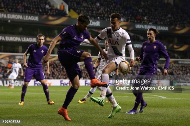 Fiorentina's Nenad Tomovic and Tottenham Hotspur's Dele Allii battle for the ball