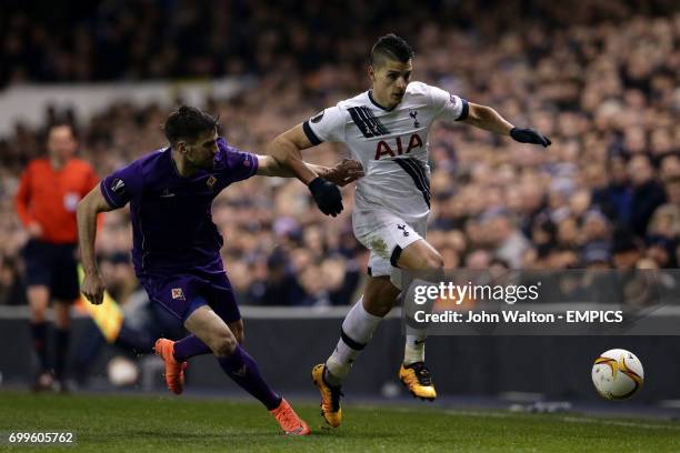 Fiorentina's Nenad Tomovic and Tottenham Hotspur's Erik Lamela battle for the ball