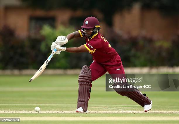 Shanel Daley of West Indies drives the ball during the ICC Women's World Cup warm up match between West Indies and South Africa at Oakham School on...