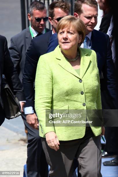 German Chancellor Angela Merkel arrives at the European People's Party headquarters in Brussels for a EPP meeting on the sidelines of the EU leaders...