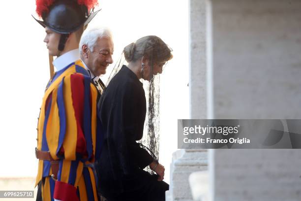 Queen Maxima is welcomed by the prefect of the papal household Georg Gaenswein as she arrives at the Vatican for an audience with Pope Francis on...
