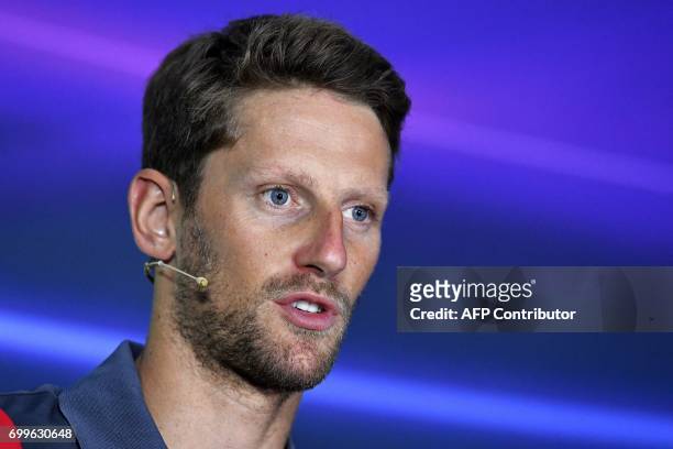 Haas F1's French driver Romain Grosjean speaks during the drivers press conference ahead of the Azerbaijan Grand Prix at the Baku City Circuit in...