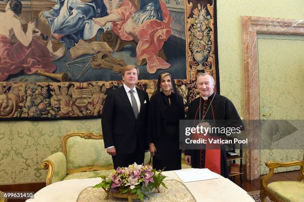 Vatican sercretary of State cardinal Pietro Parolin meets Dutch King Willem-Alexander and Queen Maxima at the Apostolic Palace on June 22, 2017 in...