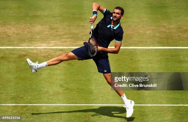 Marin Cilic of Croatia returns the ball during the mens singles second round match against Stefan Kozlov of The United States on day four of the 2017...