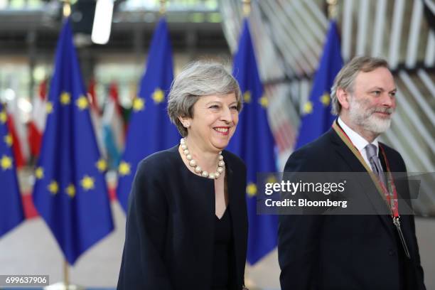 Theresa May, U.K. Prime minister, left, and Tim Barrow, U.K. Permanent representative to the European Union , arrive for a European Union leaders...
