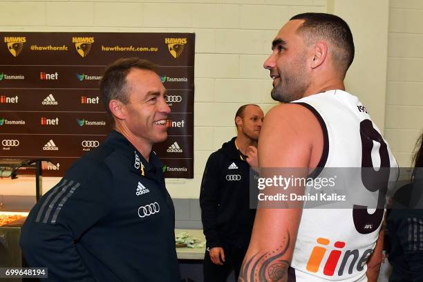 Hawks head coach Alastair Clarkson chats with Shaun Burgoyne of the Hawks after the round 14 AFL match between the Adelaide Crows and the Hawthorn...