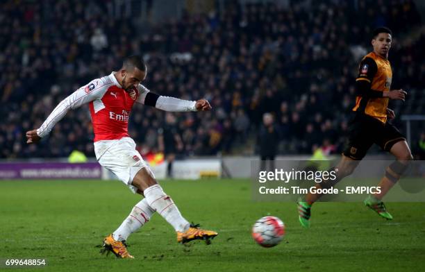 Arsenal's Theo Walcott scores his side's fourth goal of the game