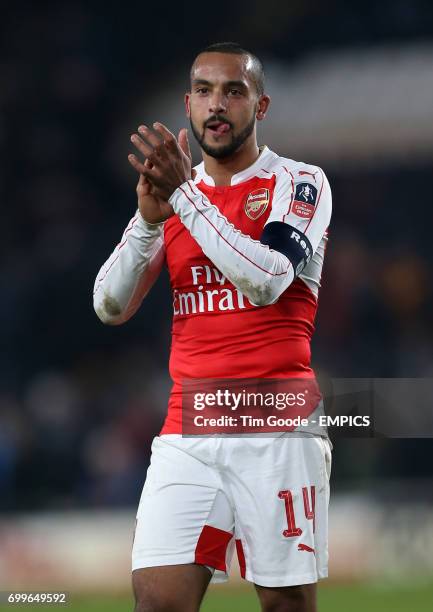 Arsenal's Theo Walcott celebrates after the final whistle