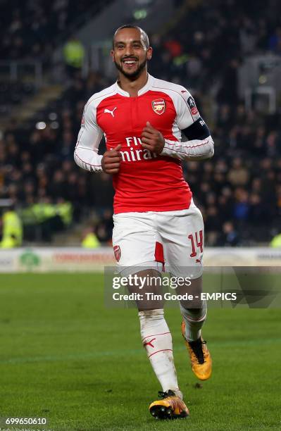 Arsenal's Theo Walcott celebrates scoring his side's fourth goal of the game