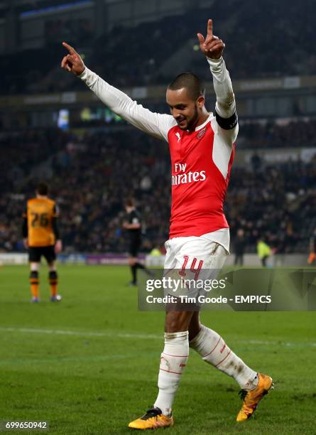 Arsenal's Theo Walcott celebrates scoring his side's fourth goal of the game