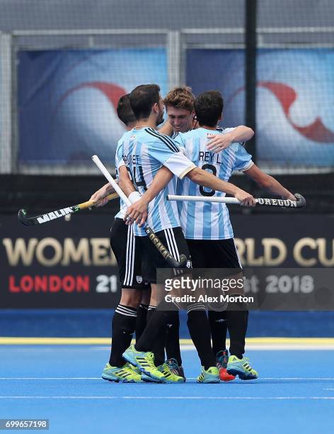 Maico Casella of Argentina celebrates scoring his teams first goal with teammates during the quarter final match between Argentina and Pakistan on...