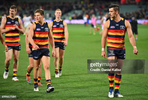 Taylor Walker of the Crows walks from the field after the round 14 AFL match between the Adelaide Crows and the Hawthorn Hawks at Adelaide Oval on...