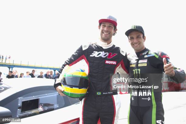 Johann Zarco of France and Monster Yamaha Tech 3 and Bruno Senna of Brasile pose during the pre-event "A race between a Yamaha M1 and a McLaren GT3"...