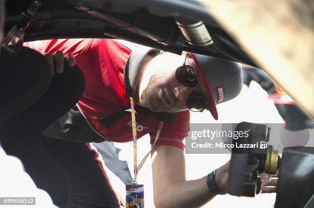 Bruno Senna of Brazil looks on during the pre-event "A race between a Yamaha M1 and a McLaren GT3" during the MotoGP Netherlands - Preview on June...